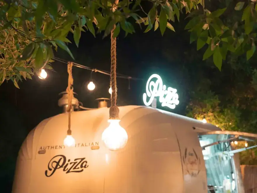 The Ciao Napoli truck lit up at night
